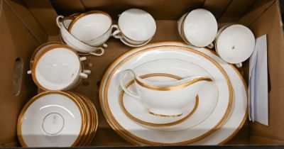 A Royal Doulton Royal Gold dinner service for six with extras (57 pieces)