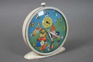 A 1950s/60s Smiths 'Noddy' alarm clock with 10 cm decorative dial featuring nodding Noddy