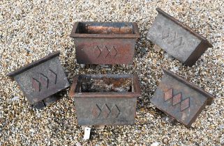 Five vintage cast iron rain water hoppers, each with triple lozenge design, sizes vary (5)