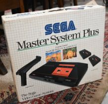 A boxed Sega Master System Plus (not tested)