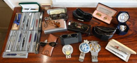 Various sunglasses including Ray Ban, Police, etc to/w various pens, car badges etc