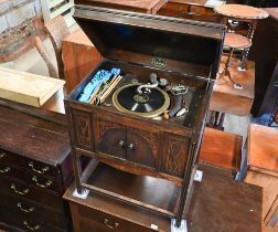A vintage Dulceola oak cased record player / gramophone cabinet, as found and part missing to/with a