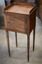 A 19th century mahogany pot cupboard on slender turned supports, 36 cm wide x 30 cm deep x 82 cm