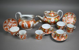 A quantity of Regency New Hall china orange-ground tea wares with floral and foliate decoration (a/