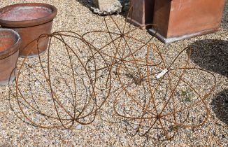 A trio of weathered steel garden spheres (3)