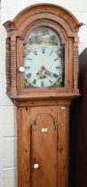 A 19th century provincial pine longcase clock with thirty hour movement, the dial painted with