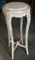 A Continental marble top jardiniere stand, carved painted and gilded disress finish base, 40 cm diam