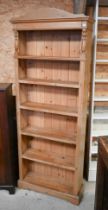 A modern pine six tier open bookcase, 72 cm x 22 cm x 191 cm h
