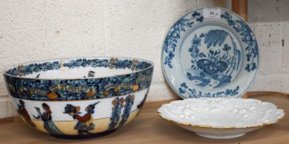 A 19th century Delft blue and white plate with chinoiserie floral decoration, 22.5 cm, to/w a