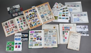 A quantity of mid 20th century and later World stamps mostly in albums, to/w First Day Covers