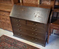 A George III mahogany fall front bureau, with two short over three long graduated drawers, 112 cm