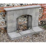 A cast stone fire surround with hearth, 92h x 135cm w o/a