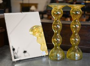 A pair of Anne Nillson (Sweden) design yellow glass baluster candlesticks 36 cm to/w an unframed