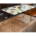 A 1960s Anoretti (Italian) design coffee table with abstract-design melamine top, on detachable