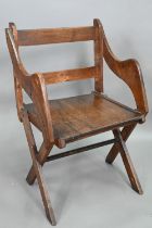 An antique Glastonbury style oak chair