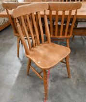 A harlequin set of six beech dining chairs comprising four standard and two carvers (6)
