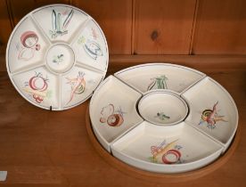 A Poole pottery five-piece hors d'oeuvres set, painted with vegetables, on wooden tray, 31 cm, to/