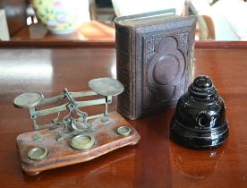 A Victorian embossed leather photograph album with gilt brass lock, containing a quantity of