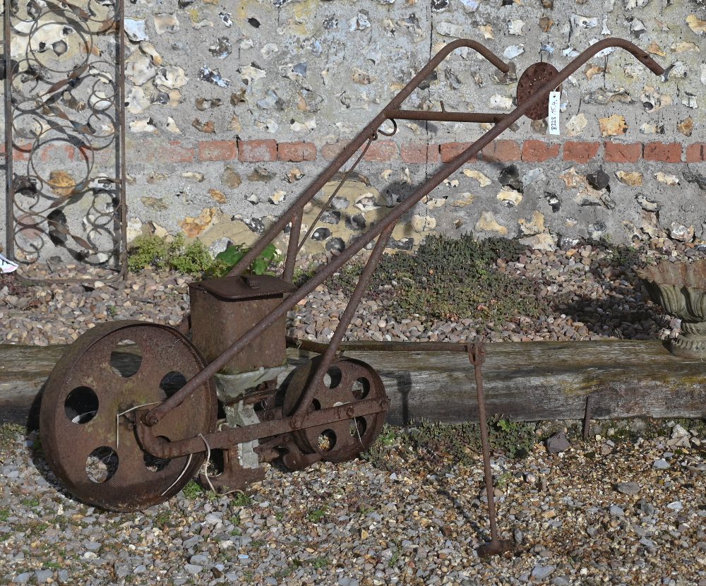 An antique cast iron garden seeder a/f - Image 6 of 6