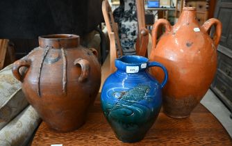 An Arts & Crafts Brannam Barum blue glazed jug decorated with fish, 28 cm to/w a Mediterranean