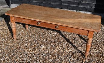 A vintage pine farmhouse dining table with single drawer and turned supports, 214 cm wide x 90 cm