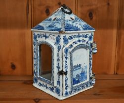 A 19th century Delft blue and white lantern, painted with landscapes 21 cm