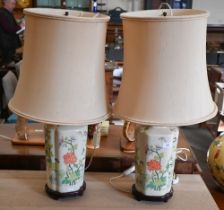 Two Asian ceramic table-lamps, with floral decoration, 40 cm high (2)