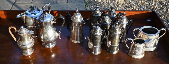 A set of six electroplated coffee pots, two other coffee pots, two hot water jugs and a milk and