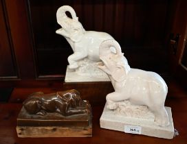 WITHDRAWN - A pair of Art Deco pottery elephants, 21 cm high, to/w a sleeping bloodhound
