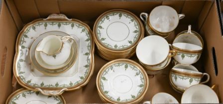 An Edwardian Cauldon Ltd china tea service with Sheraton Revival decoration, for twelve settings