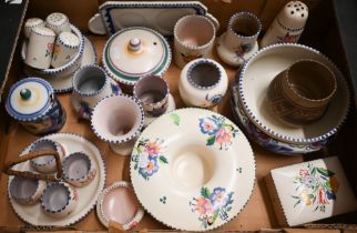 Approximately twenty-five pieces of Poole pottery with painted decoration and impressed marks,