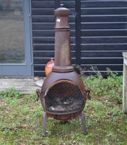 A cast iron patio heater/chimenea, 140 cm high