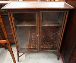 A 'bamboo' framed two door glazed bookcase/display cabinet, 76 cm wide x 32 cm deep x 94 cm high