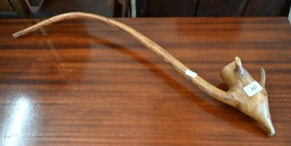 An antique wooden large smoking pipe, 65 cm