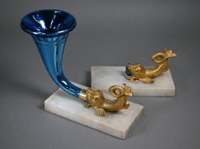 A cornucopia vase with mirrored and cut glass horn supported by ormolu dolphin, on alabaster base,