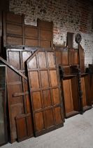 A large quantity of oak wall panels, components, door and parts for large wardrobe/cupboard, as