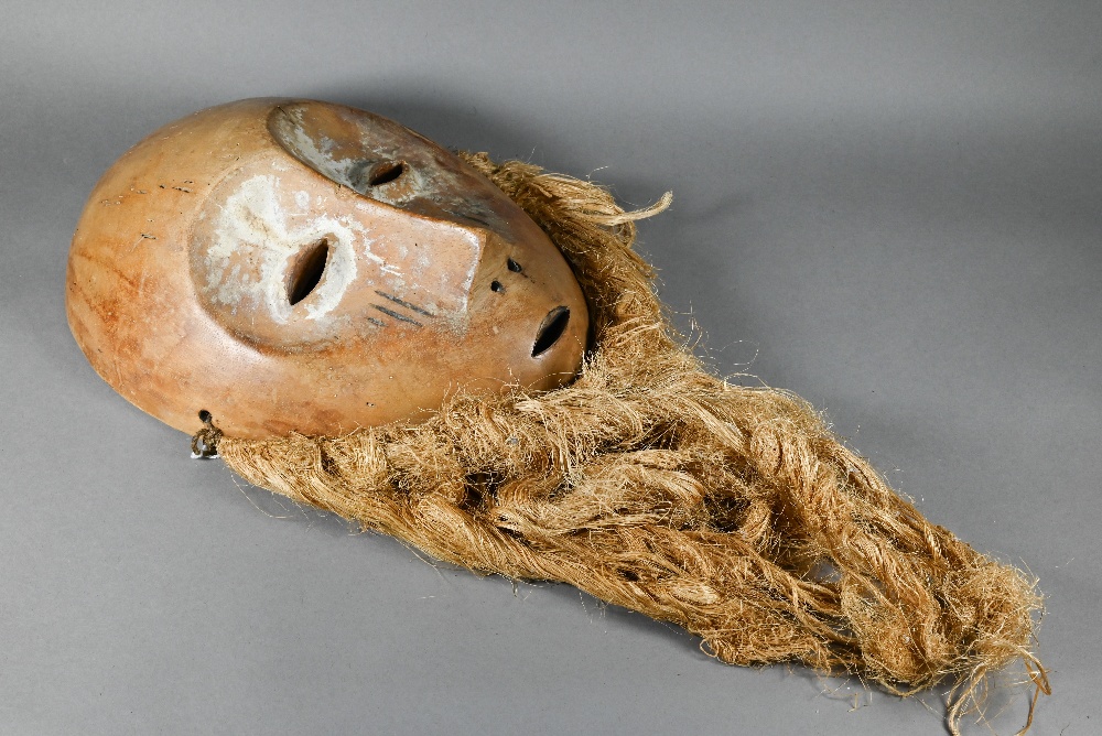 A 20th century African Lukwakongo 'passport' mask, Lega Bwani society, Dominican Republic of - Image 8 of 12