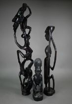 Three African figural carvings, 79-35 cm
