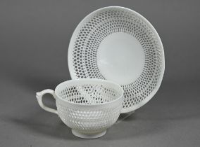 A Victorian Royal Worcester cabinet cup and saucer with delicate reticulated body, saucer 11 cm diam