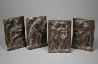 A set of four Art Deco small ceramic relief plaques with bronzed glaze, depicting Biblical scenes (