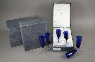 Six boxed pairs of St Louis glass blue flash and star-cut champagne flutes (boxes a/f)