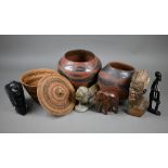 Two African terracotta cooking pots with incised and painted decoration, 24/21 cm diam to/w a