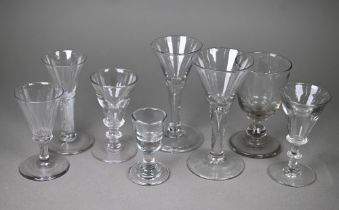 A Georgian drinking glass with conical bowl on airtwist stem and domed foot, 12.5 cm to/w two