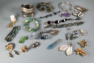 Collection of costume jewellery including Victorian-style white metal half-hinged buckle with chased