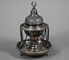 An Egyptian .900 grade incense burner of traditional urn form, the domed cover with crescent