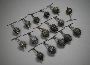 A collection of sixteen Serbian/Dalmatian white metal military uniform buttons of globular