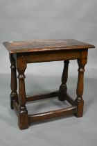 A 17th century style elm joint stool, on turned supports, 53 cm x 27 cm x 50 cm h