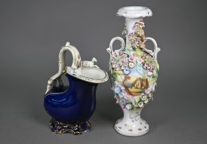 A 19th century Staffordshire china floral-encrusted vase painted with castle and abbey ruin, 30 cm