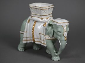 A Victorian Royal Worcester vase modelled as an elephant with howdah, by James Hadley, 20 cm high