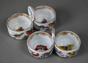 Two 19th century Meissen porcelain double salts with ring handles, outside decorated with birds,